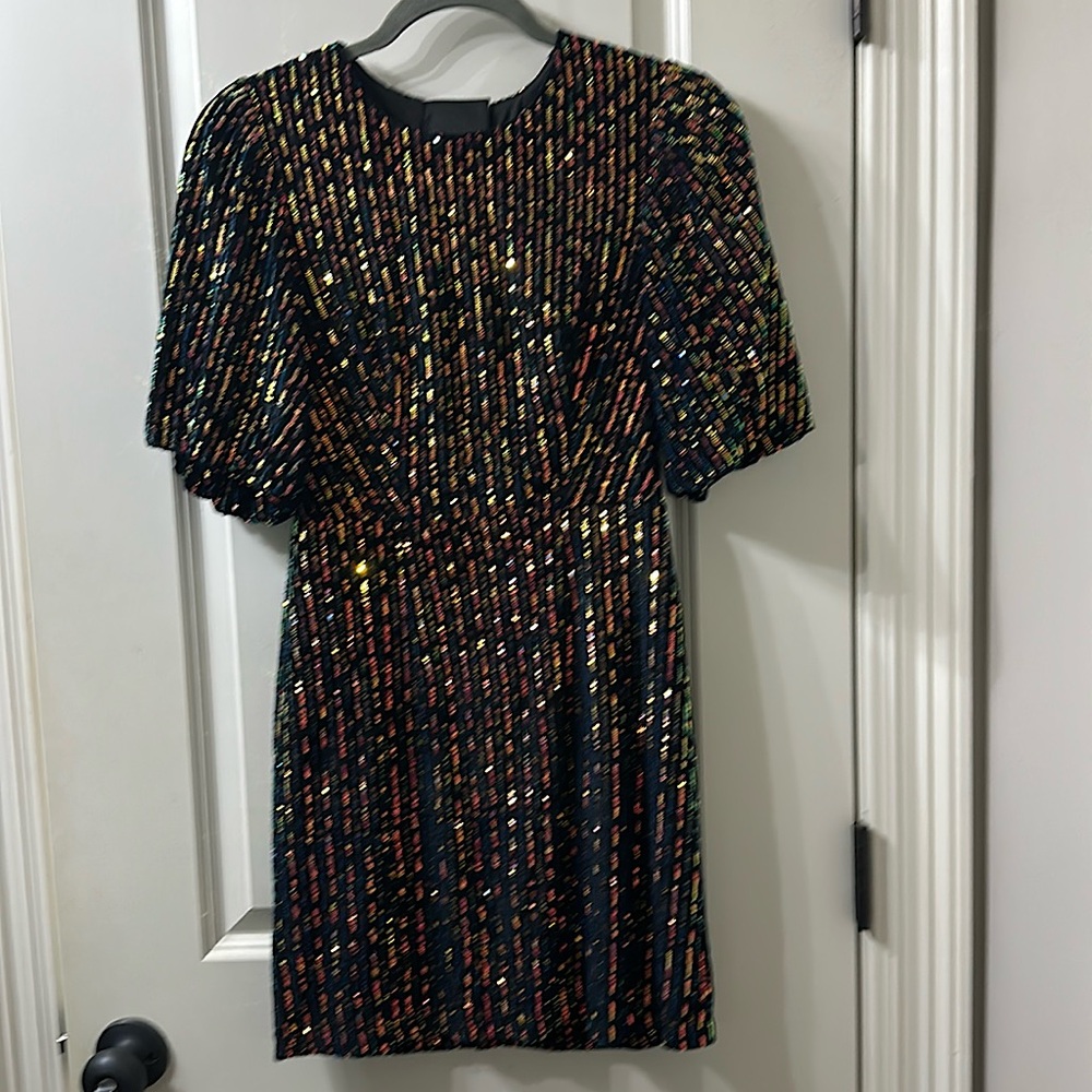 Sequin cocktail dress. 100% polyester. Size small.
